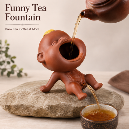 Funny ceramic tea fountain tea pet pouring tea from the mouth to the cup, designed for tea, coffee, and quirky drink serving