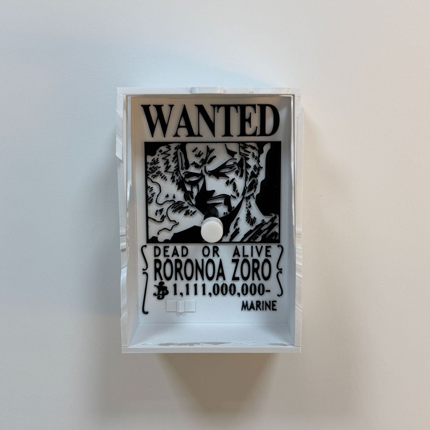 3D printed Roronoa Zoro 'Wanted Dead or Alive' poster, repurposed as a functioning single toggle light switch cover, featuring his Wano arc bounty and portrait. zoro shadow lamp