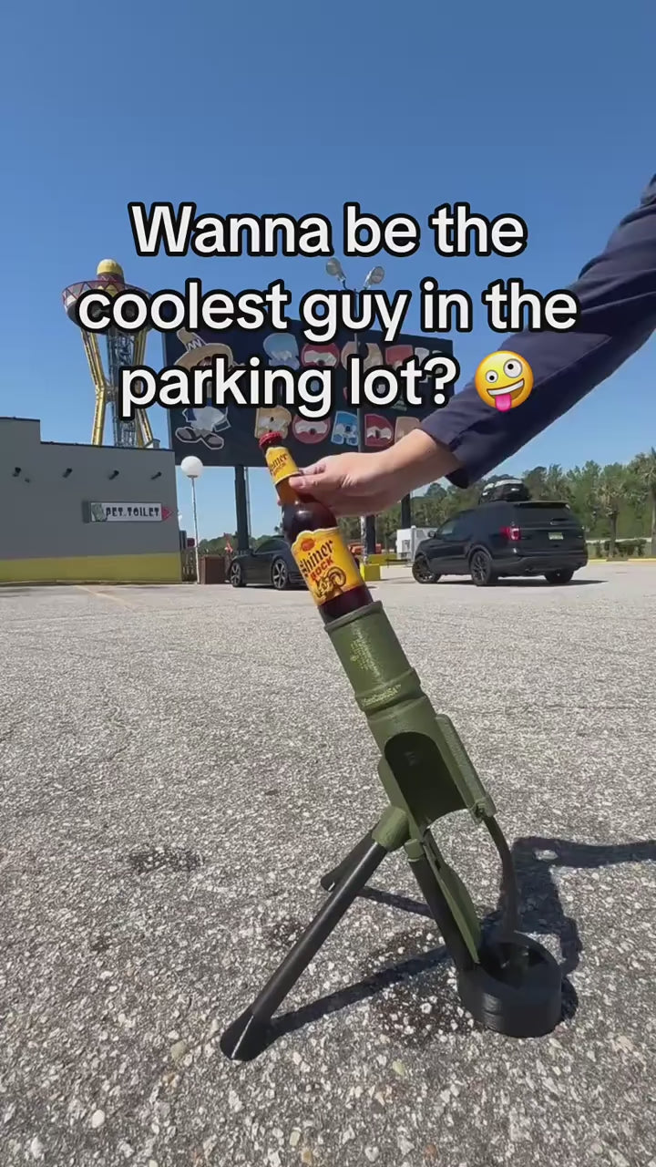 Mortar bottle opener launching a cap from a 330ml beer bottle